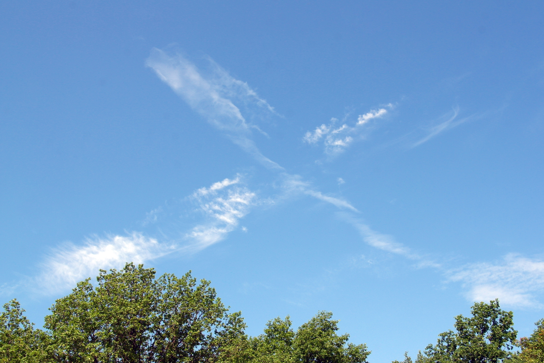 крест из облаков