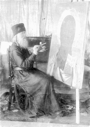 Преподобный Герман за работой в иконописной мастерской