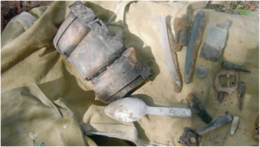 Остатки снаряжения и личного имущества погибших воинов, обнаруженные во время раскопок. 2008 год