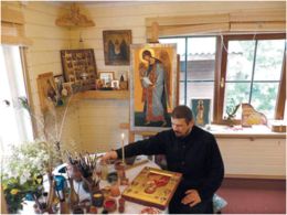 Иконописец монах Андрей (Кожевников) в своей мастерской