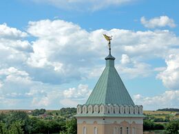 Башня надвратной Владимирской церкви с ангелом - символ Оптиной пустыни