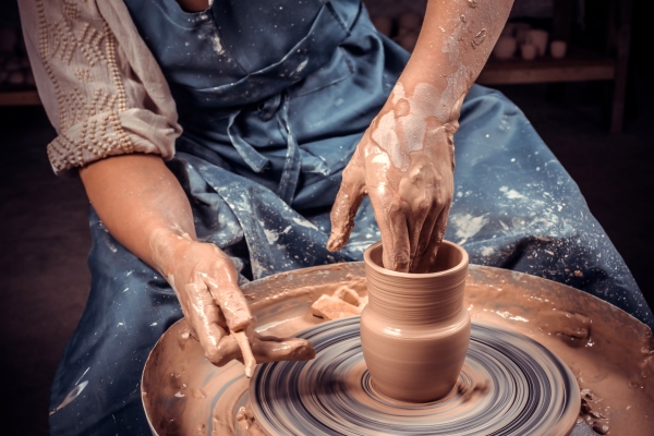 craftsman master making ceramic pot on the pottery wheel concept for woman in freelance business hobby close up - Запеканки в духовке: правила приготовления