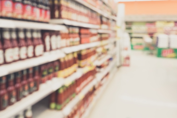 ketchup sauce seasoning bottles products in supermarket shelves blurred background - Венгерское лечо
