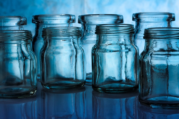 a group of bottle on blue background - Маринованные грибы на зиму