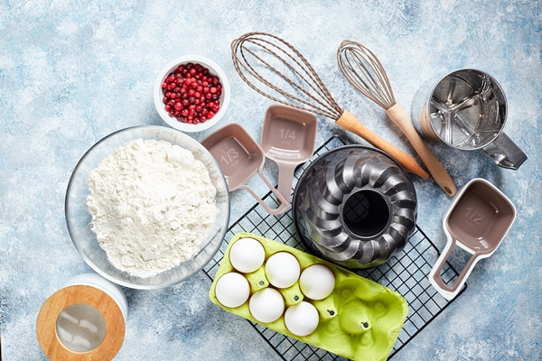 baking ingredients and utensils flour eggs baking dish - Баба муслиновая