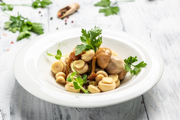 canned mushrooms with pepper and parsley on wooden background restaurant menu dieting cookbook recipe - Салат «Южная ночь»