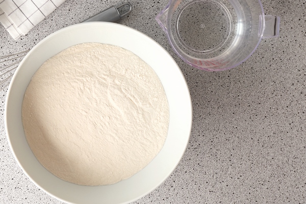 flour egg and water in kitchenware on grey table - Постные блинцы "Простые"