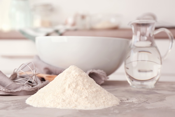 heap of flour and kitchenware on light table - Постные блинцы на фасолевом отваре