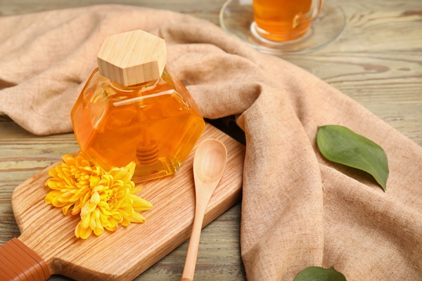 jar of sweet honey on table - Медовый перец на зиму