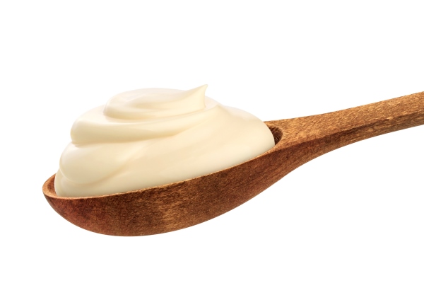 sour cream in spoon isolated on white - Салат «Фасолька»