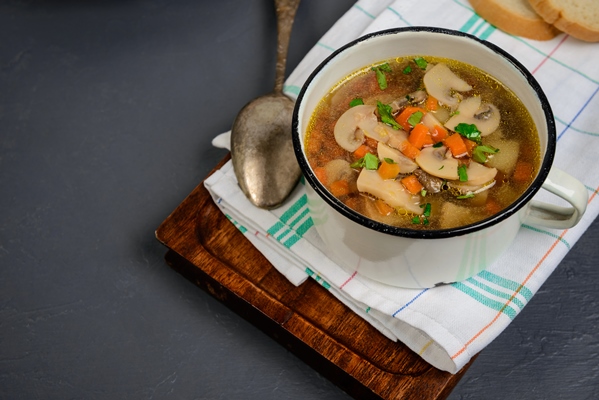 tasty soup in pan over gray surface close up copy space - Постный грибной суп-пюре