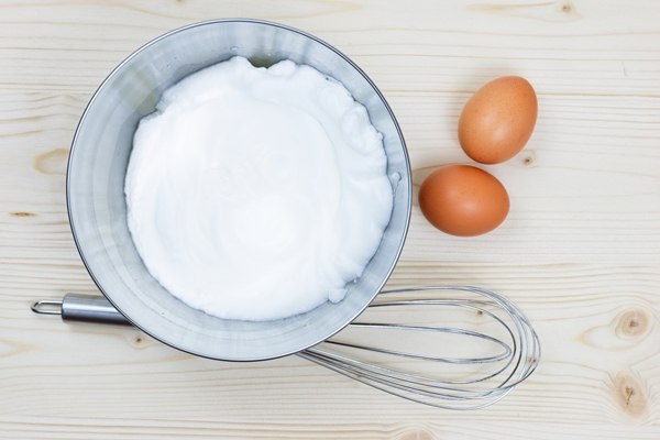 top view whipped egg whites for cream on wooden table 1 - Кекс "Пасхальный ягненок"