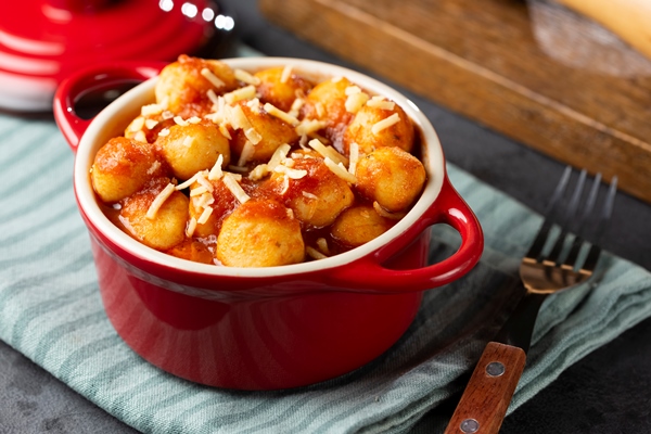 gnocchi with tomato sauce and grated parmesan cheese - Клёцки с грибами