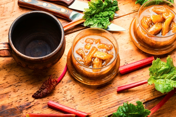 homemade rhubarb jam in glass jar sweet food - Маседуан из ревеня