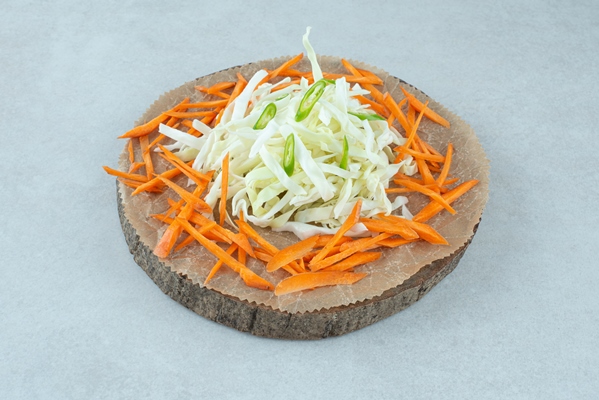 julienned various vegetables on wooden piece - Постная фаршированная свёкла под соусом