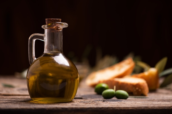 olive oil with bread on a wooden table rustic vintage composition 1 - Рулет с укропом