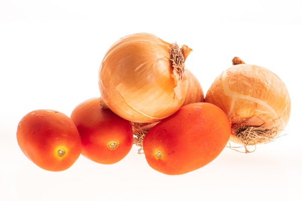 tomates and onions orange isolated on white - Свекольная икра с чесноком