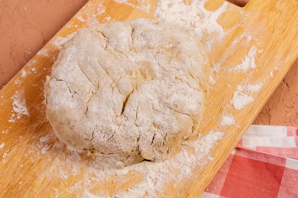 flour on the table to make dough close up space for - Гречневый хлеб без пшеничной муки