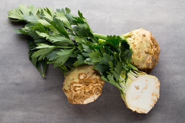 fresh celery root with leaf isolated on white background - Суп вегетарианский