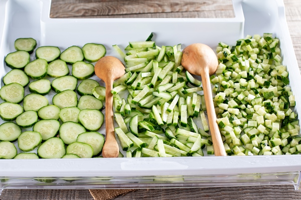frozen green cucumbers chopped cucumbers in the freezer frozen food concept - Холодник