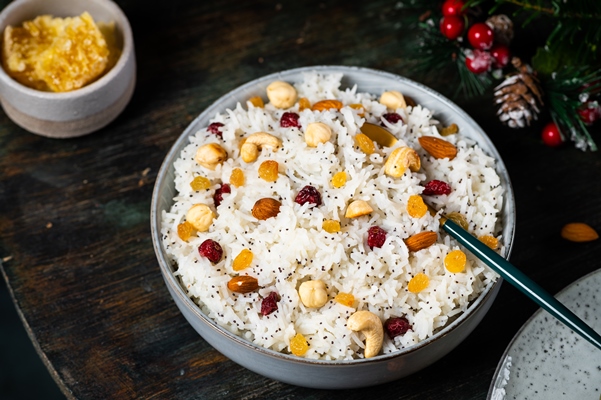 kutia is a ceremonial grain dish christmas sweet meal boiled rice porridge traditional slavic holiday ritual dish sweet pilaf with nuts kutya ukrainian orthodox christmas - Кутья из риса с орехами и сухофруктами