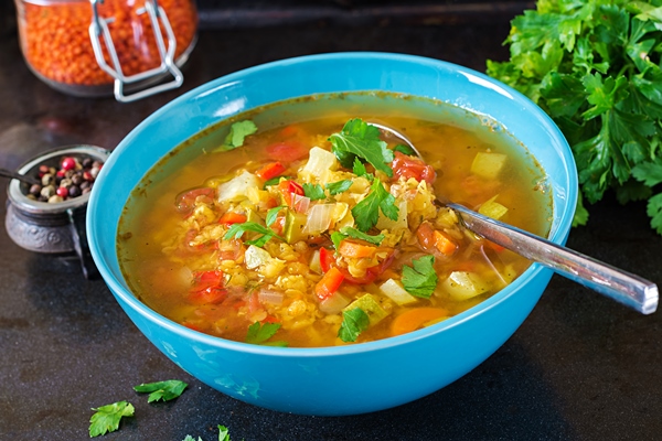 red lentil soup on dark surface healthy eating concept vegan food - Суп чечевичный