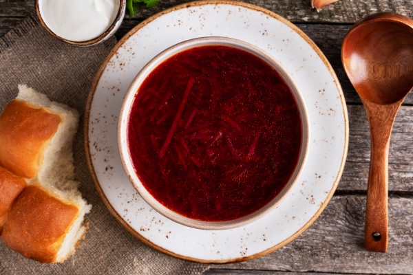 tasty borsch pampushkas traditional ukrainian cuisine red soup beet potato meat carrot cabbage and garlic top view closeup - Борщ свекольный с перловой крупой