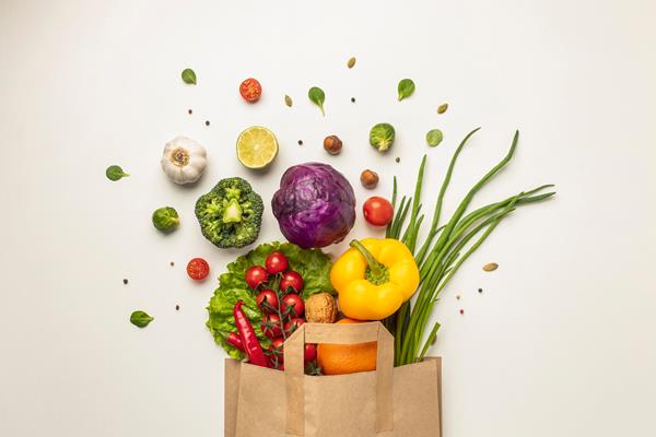 top view of assortment of vegetables in paper bag - Суп овощной постный