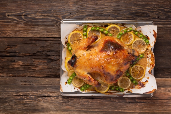 christmas or thanksgiving duck baked with spices in the oven - Жареное мясо