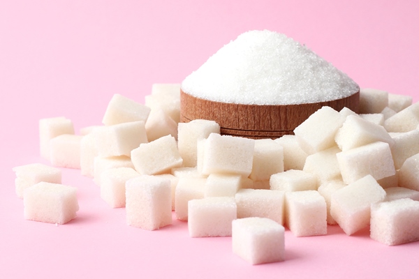 refined sugar on a colored background diabetes concept excess sugar - Яблочные цукаты