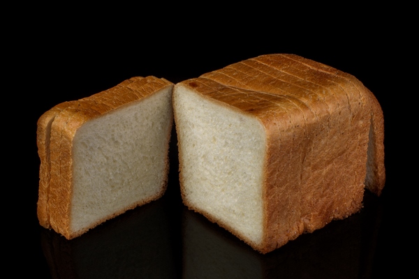white bread for toast on a black background - Бутерброды "Золотая рыбка"