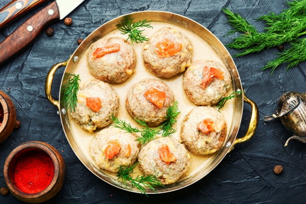delicious homemade cod roe fish meatballs fish cutlets decorated with salmon - Рисово-рыбные шарики