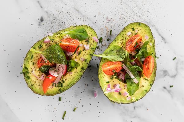 flat lay delicious healthy salad in avocado composition 1 - Салат "Лодочки" из авокадо