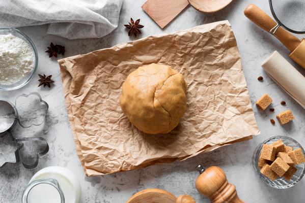 top view cookie dough on parchment paper - Рождественское ореховое печенье