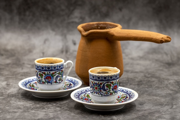 turkish coffee on a dark background traditional turkish cuisine flavor close up - Кофе с кардамоном и сахаром
