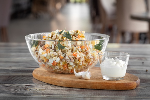 bowl of olivier traditional salad mix of chopped boiled vegetables and meat 2 - Салат "Оливье"