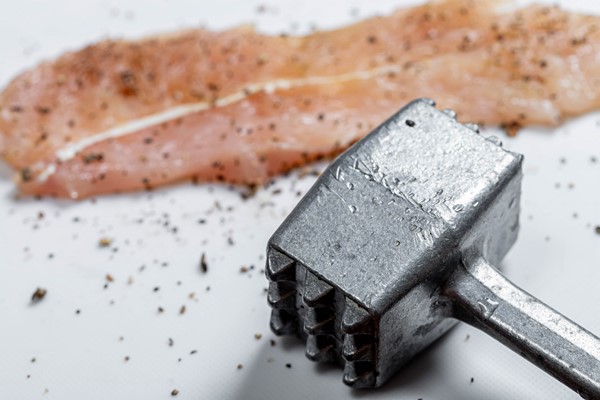 closeup of an iron hammer and a kitchen steak spice the concept of cooking - Правила выбора и приготовления мяса