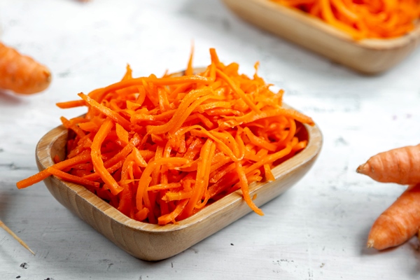 fresh carrot salad on the table - Салат с огурцом, морковью и яблоком