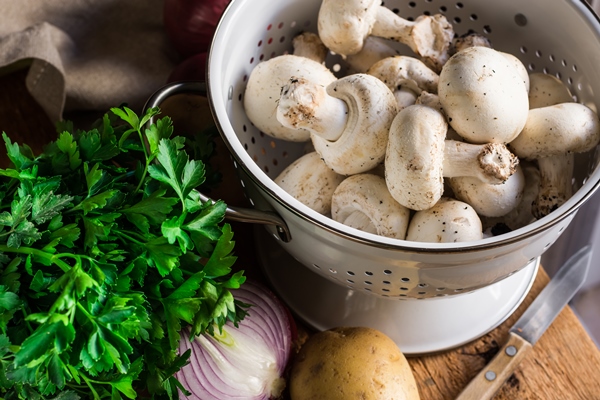 fresh organic ingredients for preparing healthy vegetarian meal potatoes mushrooms onion parsley - Грибные тефтели