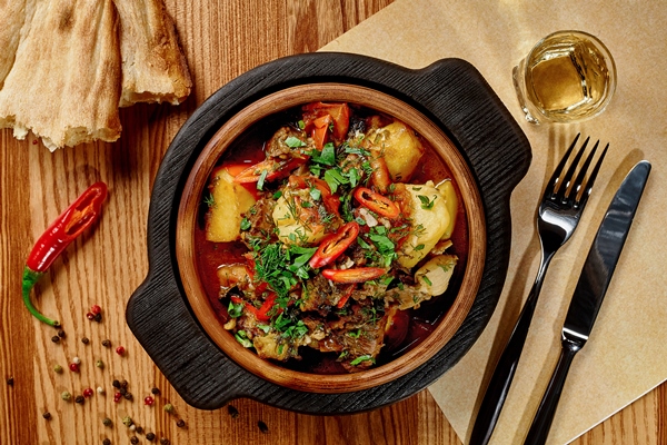 georgian lamb stew chanakhi with vegetables in ketsi pan - Чанахи