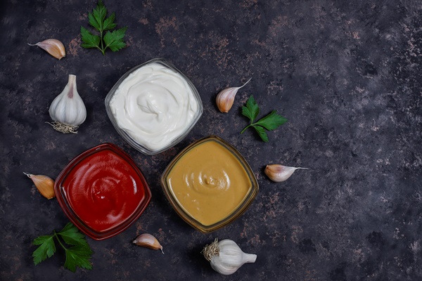 homemade ketchup mustard mayonnaise sauce ingredients dark top view - Правила приготовления салатов