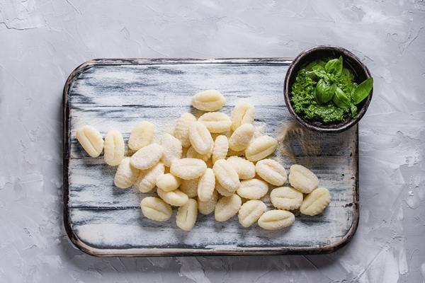 raw uncooked potato gnocchi - Суп молочный с картофельными клёцками