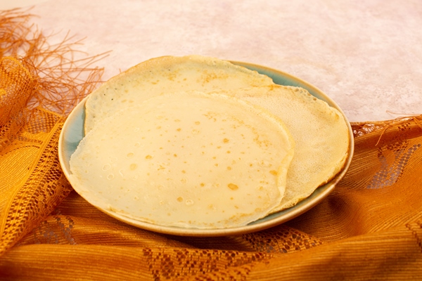 a top view delicious pancakes inside round plate on the pink desk food meal dessert pastry 2 - Блинчатый пирог с грибами