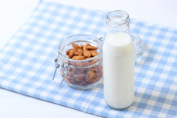 almond milk and almonds on the table vegetable milk vegetarian milk - Монастырская кухня: архиерейская солянка, постный "Наполеон"