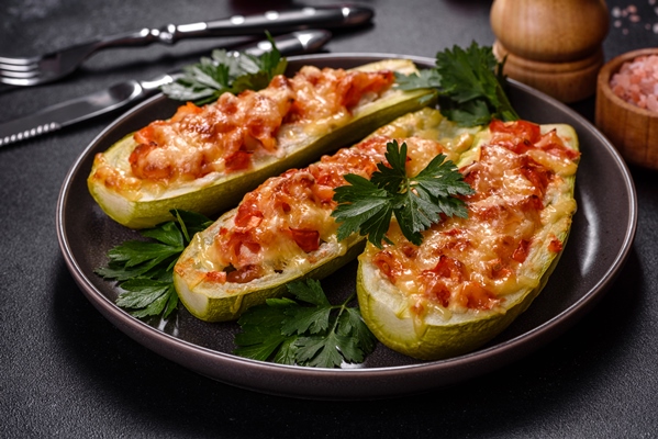 baked stuffed zucchini boats with minced chicken mushrooms and vegetables with cheese - Кабачки с мясом