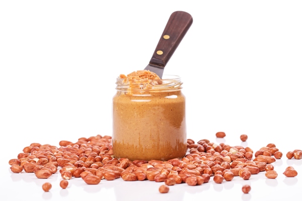 delicious peanut butter on the table - Хрустящая арахисовая паста