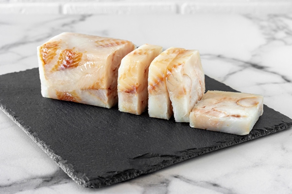 frozen fillet of fish pangasius on stone board ready for cooking - Монастырская кухня: манный мусс с клюквой и расстегаи