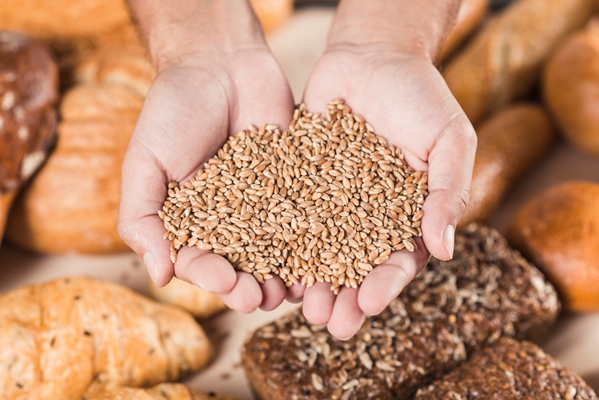 handful wheat grains over the baked fresh bread - Коливо по-монастырски на пятницу