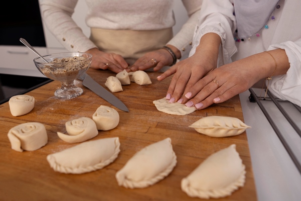 high angle women cooking for ramadan - Монастырская кухня: пшённые биточки с грибами, жареные пирожки с повидлом