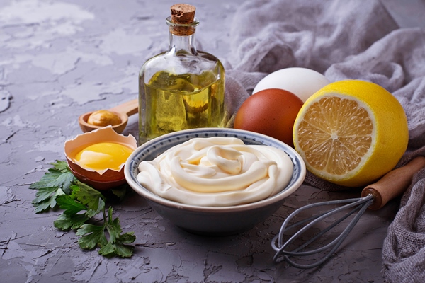 homemade mayonnaise sauce and olive oil eggs mustard lemon selective focus - Соус винегрет